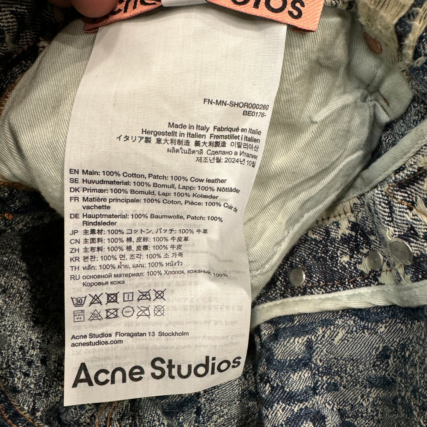 Acne Studios Distressed Waxed Denim Shorts